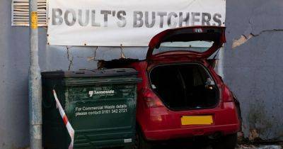 Emergency services descend after car ploughs into back of butchers' shop - manchestereveningnews.co.uk