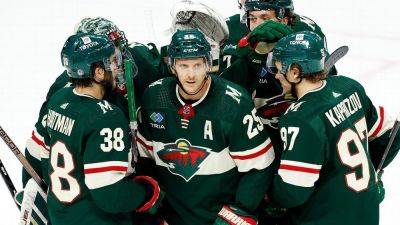 Wild, at their 'competitive best,' outlast Canucks 10-7 - ESPN - espn.com