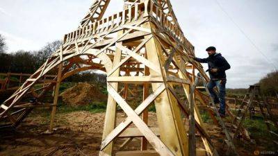 Two friends build Eiffel Tower from recycled wood ahead of Olympics - channelnewsasia.com - France