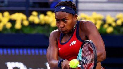 Gauff 'fuelled' by umpire row to advance in Dubai