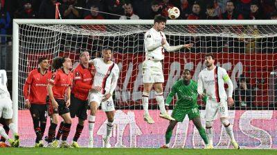 Europa round-up: AC Milan withstand Rennes fightback to progress to last-16