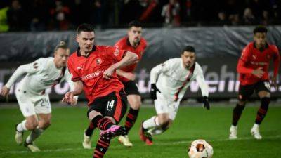 Milan and Benfica book spots in Europa League last 16