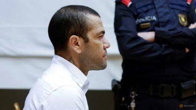 Paris St Germain - Dani Alves - Spanish court sentences Brazil's Dani Alves to prison over sexual assault - channelnewsasia.com - Spain - Brazil - Mexico
