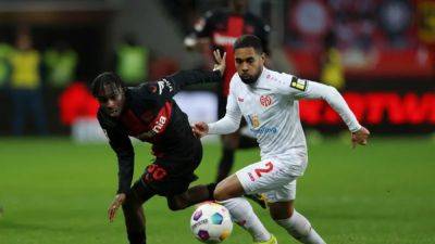 Leverkusen beat Mainz 2-1 to widen gap at top and set unbeaten record
