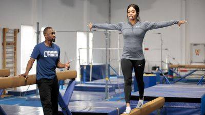Olympian Gabby Douglas 'crushed' her gymnastics return was put on hold after positive COVID test