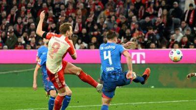 Last-gasp Kane winner sends Bayern 2-1 past Leipzig to snap losing run