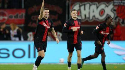 Leverkusen beat Mainz 2-1 to widen gap at top of Bundesliga and set unbeaten record