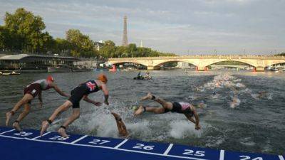 Bay - Anne Hidalgo - Paris holds its breath for Olympic swimming events in murky Seine - channelnewsasia.com - France