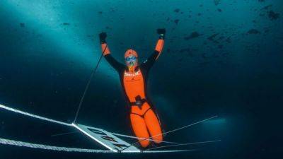 Diving-Cafolla reclaims apnea ice diving world record in just 36 hours
