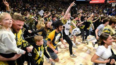 College coaches, leaders call for court-storming regulations - ESPN