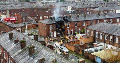 Dramatic aerial pictures show house collapse after 'explosion' as residents are evacuated - manchestereveningnews.co.uk