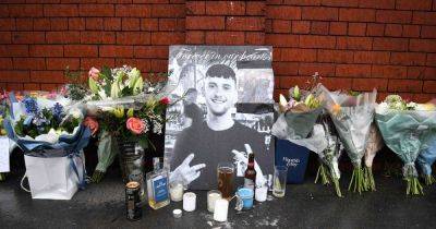 Pictures and flowers left at huge shrine for 'truly lovely lad' Ryan Evans who died in Reddish horror crash