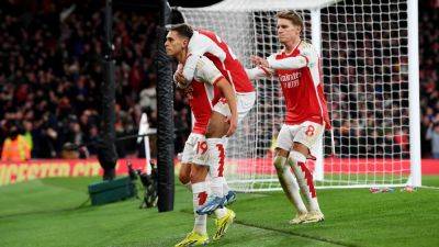 Arsenal punish Liverpool errors to cut lead at top of table