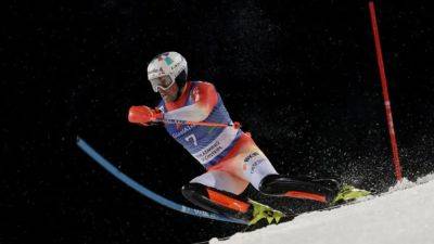 Alpine skiing-Swiss Yule claims record comeback win in slalom