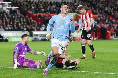 Foden hat-trick hauls Man City within two points of Premier League lead