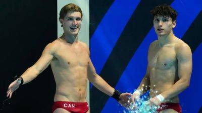 Paris Olympic - Canada's Zsombor-Murray, Wiens book Olympic men's diving spot at aquatics worlds - cbc.ca - Britain - Ukraine - Italy - Canada - China