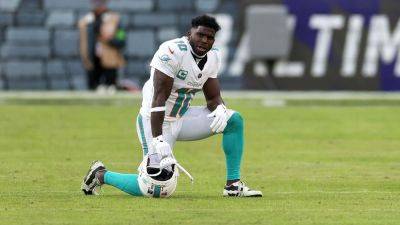 Dolphins' Tyreek Hill didn't break woman's leg, lawyer claims - ESPN