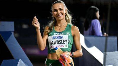 'Buzzing' Sharlene Mawdsley advances to 400m semis after photo finish