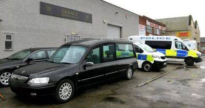 Man and woman arrested after 34 bodies removed by police from funeral directors