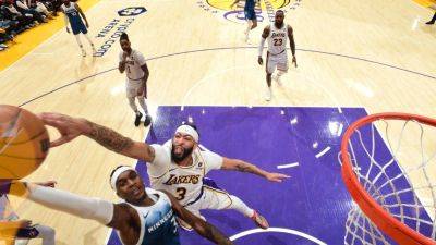 Anthony Davis - Rudy Gobert - Anthony Davis puts up historic stat line as Lakers down Wolves - ESPN - espn.com - county Bucks - Los Angeles - state Minnesota - county Davis