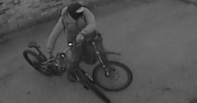 Balaclava-clad thugs threaten boy with 'zombie knife' before stealing his £4,000 bike - manchestereveningnews.co.uk