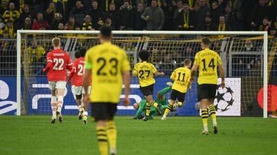 Jadon Sancho and Marco Reus fire Borussia Dortmund past PSV and into Champions League quarter-finals