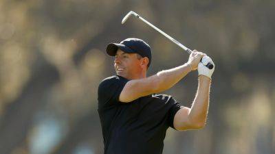 Rory McIlroy sparkles to take the lead at Players