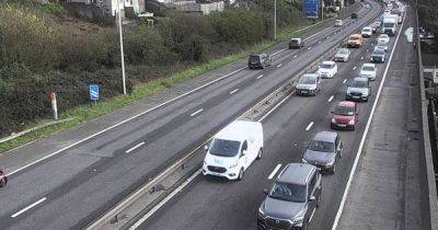 M4 vehicle fire causes long delays near Swansea - live updates