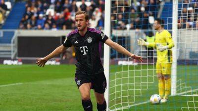 Kane scores to set record in Bayern's 5-2 win at Darmstadt