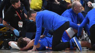Gators' Micah Handlogten stretchered off during SEC final - ESPN - espn.com - state Tennessee