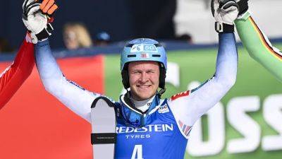 Timon Haugan gives Norway its 1st men's slalom win of season at World Cup finals
