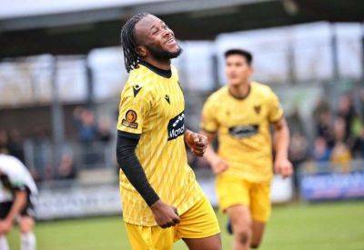 Maidstone United manager George Elokobi says defenders are privileged to learn from him following 2-0 victory at Dartford