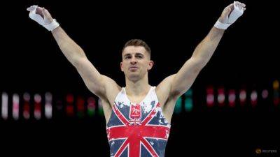 Gymnastics-Whitlock 'on right track' with British pommel title - channelnewsasia.com - Britain - Italy