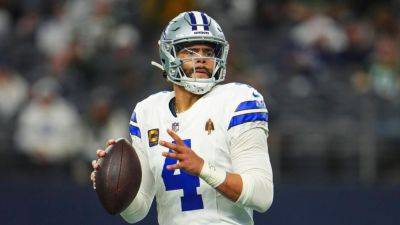 Sources - Cowboys rework Dak Prescott's contract to reduce cap hit - ESPN