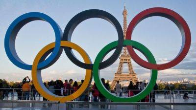 IOC bars Russia, Belarus from Paris Olympics opening parade - ESPN