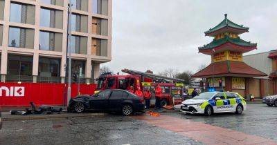 Emergency services block off part of Oldham Road after car smash