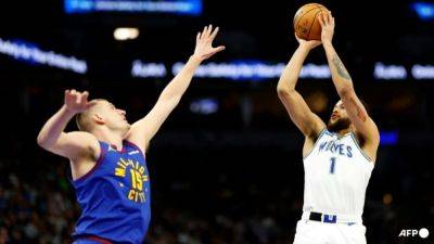 Jokic leads Nuggets past Wolves as Mavs sink Spurs