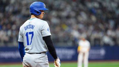 Dodgers win off Cronenworth glove failure; 2 hits for Ohtani - ESPN
