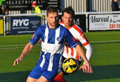 Herne Bay boss Steve Lovell hopeful forward Kane Rowland will play through the pain barrier in play-off push ahead of match against Sevenoaks Town and derby at Hythe Town