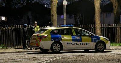 Neighbours asked to leave homes as police hunt for 'guns and grenades' on playing fields