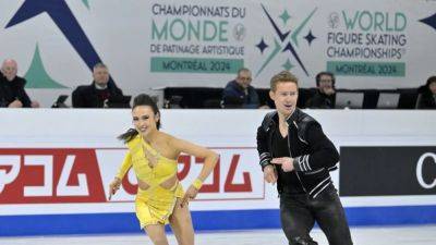 Figure skating-Americans Chock and Bates grab lead at world championships