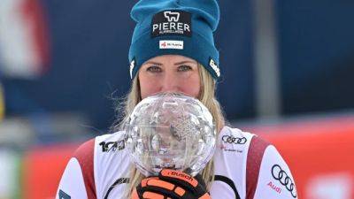 Huetter wins World Cup downhill to clinch her 1st title, deny Gut-Behrami her 4th of season