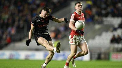Armagh rally late to snatch dramatic draw against Cork