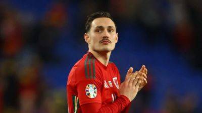 Connor Roberts - Roberts banks on power of the tache as Wales eye Euro place - channelnewsasia.com - Finland - Germany - Poland
