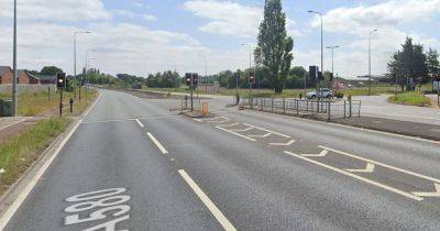 East Lancs Road incident: Woman killed after being hit by car as man arrested