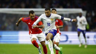 France fight back to claim 3-2 home win over Chile