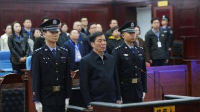 Former China football chief given life sentence for 'huge' bribery