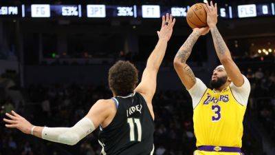Anthony Davis - Austin Reaves - Darvin Ham - 'Unpredictable' Lakers rally from 19 down to beat Bucks in 2OT - ESPN - espn.com - county Bucks - Los Angeles
