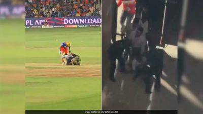 Virat Kohli - Chris Gayle - Punjab Kings - Royal Challengers Bengaluru - Virat Kohli Fan Thrashed By Security For Hugging RCB Star Mid-match? Fans Claim So In Viral Video - sports.ndtv.com - India - county Kings