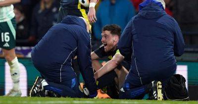 Andy Robertson injury latest as Liverpool 'hopeful' Scotland skipper has avoided serious damage